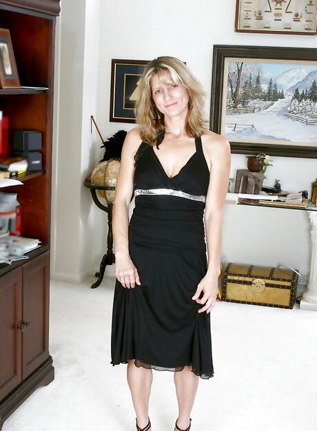 Excellent older Berkley in nice skirt exposes big knockers and masturbates 