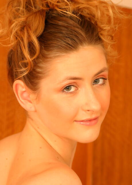 Sexy teen Eva in nice skirt baring her ass and spreading her legs 