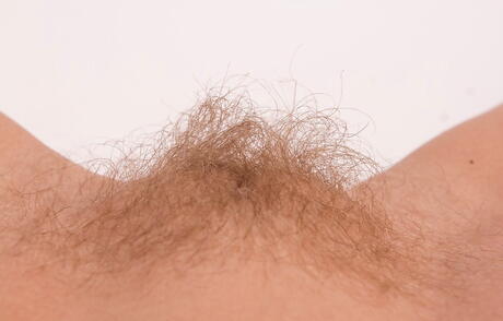 Sylphlike blonde cutie Nadin reveals small tits and hairy twat 